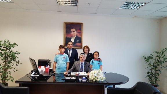 Ataköseoğlu İlkokulu 4-D sınıfı öğrencilerinden İlçe Milli Eğitim Müdürü Faik KAPTAN´ a nezaket ziyareti.